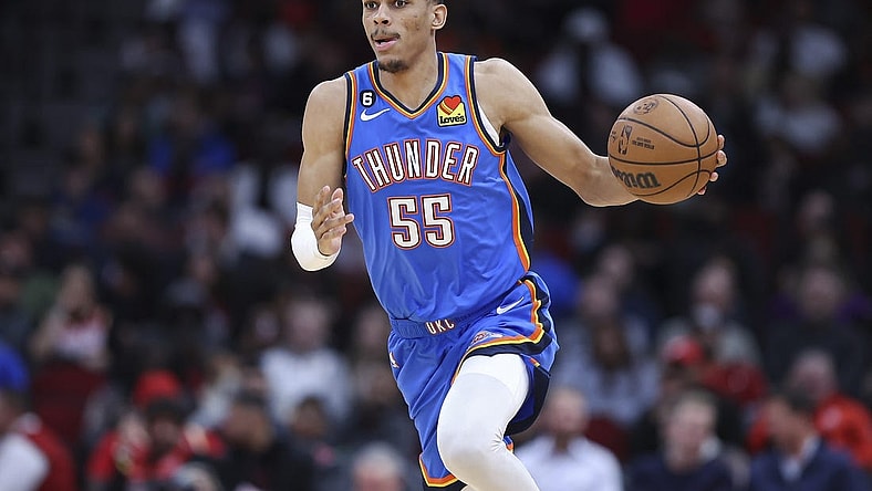 Feb 1, 2023; Houston, Texas, USA; Oklahoma City Thunder forward Darius Bazley (55) dribbles the ball during the fourth quarter against the Houston Rockets at Toyota Center. Mandatory Credit: Troy Taormina-USA TODAY Sports