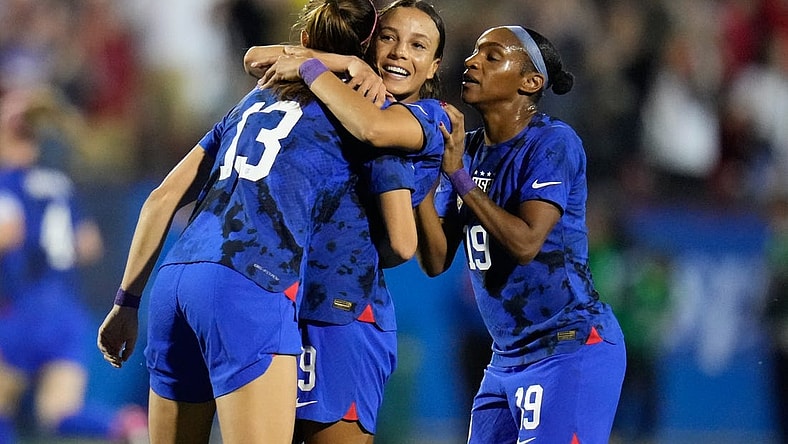 Feb 22, 2023; Frisco, Texas, USA; United States of America forward Alex Morgan (13) celebrates with forward Mallory Swanson (9) after scoring a goal against Brazil during the first half at Toyota Stadium. Mandatory Credit: Chris Jones-USA TODAY Sports