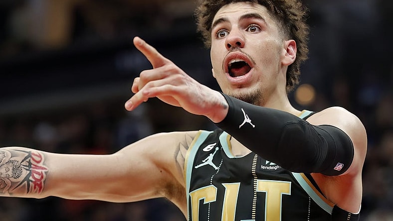 Feb 24, 2023; Minneapolis, Minnesota, USA; Charlotte Hornets guard LaMelo Ball (1) questions a referee's call for the Minnesota Timberwolves in the fourth quarter at Target Center. Mandatory Credit: Bruce Kluckhohn-USA TODAY Sports