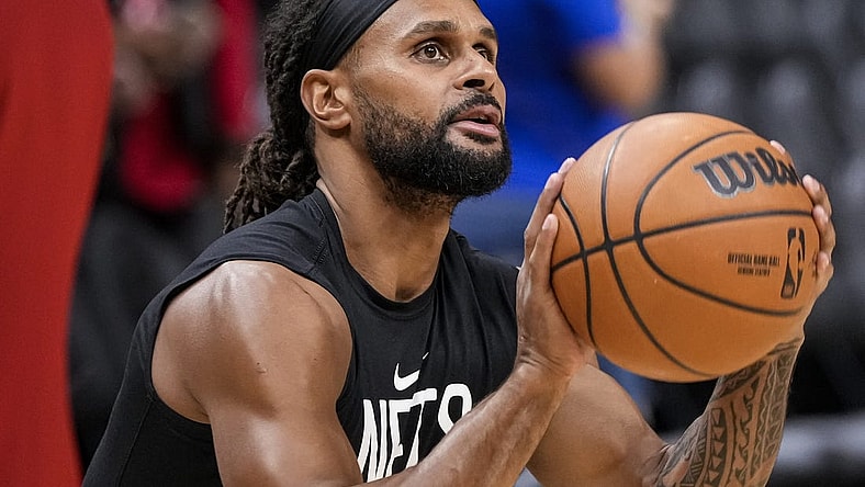 Feb 26, 2023; Atlanta, Georgia, USA; Brooklyn Nets guard Patty Mills (8) warms up on the court prior to the game against the Atlanta Hawks at State Farm Arena. Mandatory Credit: Dale Zanine-USA TODAY Sports