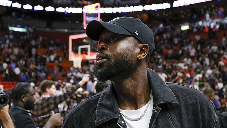 Mar 22, 2023; Miami, Florida, USA; Former Miami Heat player Dwyane Wade looks on after the game between the Miami Heat and New York Knicks at Miami-Dade Arena. Mandatory Credit: Sam Navarro-USA TODAY Sports