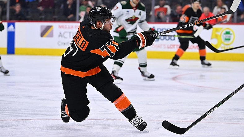 Mar 23, 2023; Philadelphia, Pennsylvania, USA; Philadelphia Flyers defenseman Tony DeAngelo (77) shoots against the Minnesota Wild in the third period at Wells Fargo Center. Mandatory Credit: Kyle Ross-USA TODAY Sports