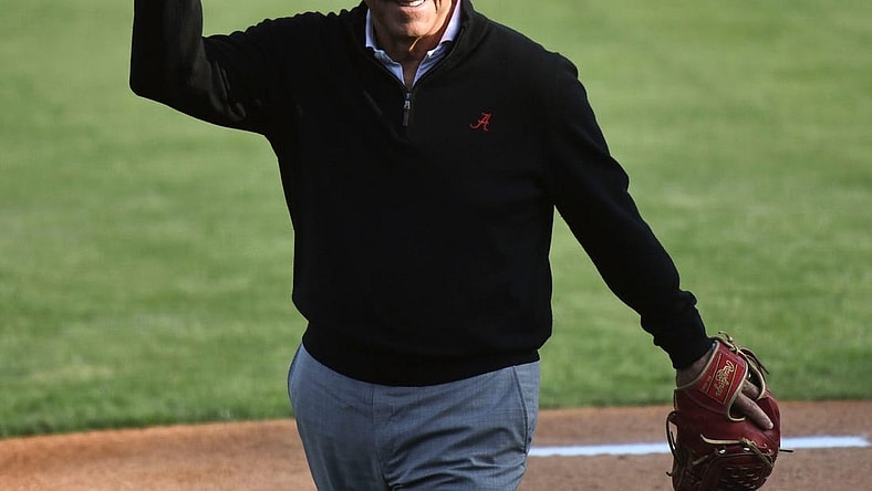 Alabama head football coach Nick Saban waves to the crowd after throwing out the first pitch before the Crimson Tide  s game with Samford at Sewell-Thomas Stadium Tuesday April 25, 2023.

College Baseball Alabama Vs Samford