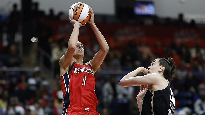 May 19, 2023; Washington, District of Columbia, USA; Washington Mystics forward Elena Delle Donne (11) shoots the ball over New York Liberty forward Breanna Stewart (30) in the fourth quarter at Entertainment & Sports Arena. Mandatory Credit: Geoff Burke-USA TODAY Sports