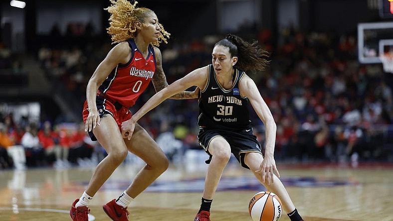 May 19, 2023; Washington, District of Columbia, USA; New York Liberty forward Breanna Stewart (30) drives to the basket as Washington Mystics center Shakira Austin (0) defends at Entertainment & Sports Arena. Mandatory Credit: Geoff Burke-USA TODAY Sports