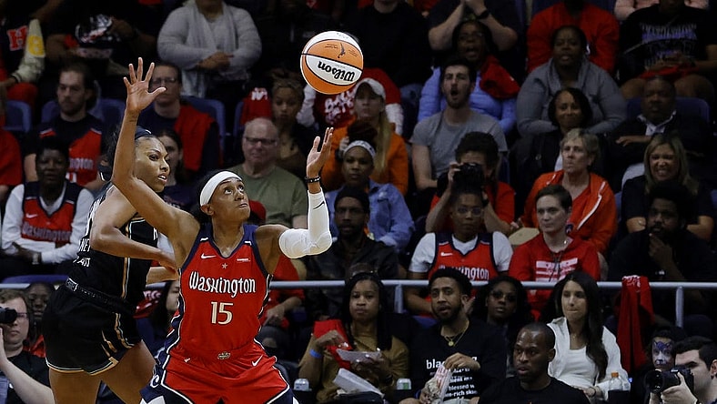 May 19, 2023; Washington, District of Columbia, USA; Washington Mystics guard Brittney Sykes (15) and New York Liberty forward Betnijah Laney (44) battles for the ball at Entertainment & Sports Arena. Mandatory Credit: Geoff Burke-USA TODAY Sports