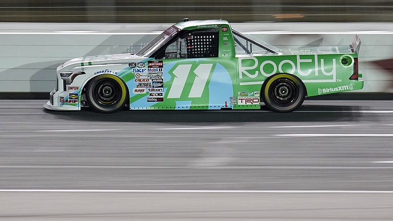 May 26, 2023; Concord, North Carolina, USA; NASCAR Craftsman Truck Series driver Corey Heim (11) during the North Carolina Education Lottery 200 at Charlotte Motor Speedway. Mandatory Credit: Jim Dedmon-USA TODAY Sports