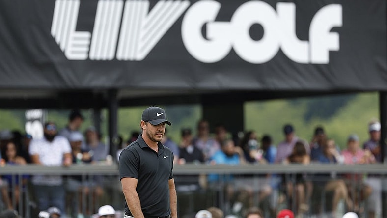 Brooks Koepka watches his putt on the fourth green during the final round of LIV Golf Washington, D.C. golf tournament at Trump National. Mandatory Credit: Geoff Burke-USA TODAY Sports
