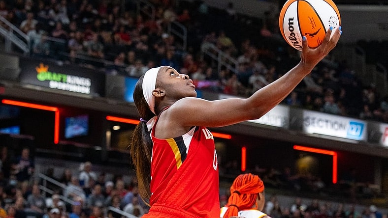 Jun 4, 2023; Indianapolis, Indiana, USA; Las Vegas Aces guard Jackie Young (0) shoots the ball in the second half against the Indiana Fever at Gainbridge Fieldhouse. Mandatory Credit: Trevor Ruszkowski-USA TODAY Sports