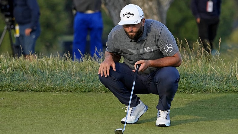 Jun 16, 2023; Los Angeles, California, USA; Jon Rahm lines up a putt on the 15th green during the second round of the U.S. Open golf tournament at Los Angeles Country Club. Mandatory Credit: Michael Madrid-USA TODAY Sports
