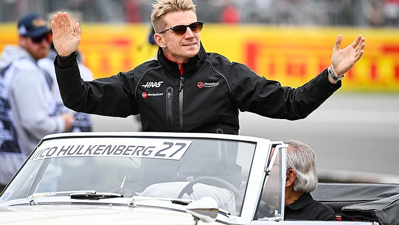 Jun 18, 2023; Montreal, Quebec, CAN; Haas F1 Team driver Nico Hulkenberg (GER) parades and salutes the crowd before the Canadian Grand Prix at Circuit Gilles Villeneuve. Mandatory Credit: David Kirouac-USA TODAY Sports