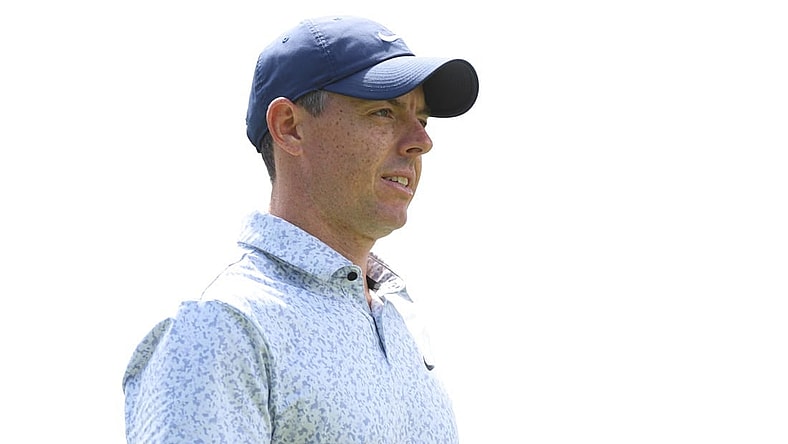 Jun 22, 2023; Cromwell, Connecticut, USA; Rory McIlroy looks up while walking off the ninth tee during the first round of the Travelers Championship golf tournament. Mandatory Credit: Vincent Carchietta-USA TODAY Sports