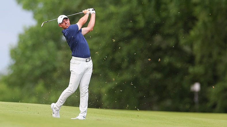 Jun 25, 2023; Cromwell, Connecticut, USA; Rory McIlroy plays his shot on the 14th hole during the final round of the Travelers Championship golf tournament. Mandatory Credit: Vincent Carchietta-USA TODAY Sports