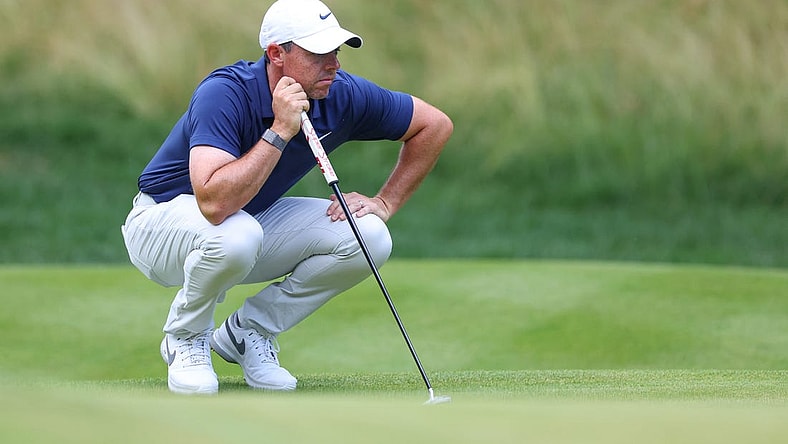 Jun 25, 2023; Cromwell, Connecticut, USA; Rory McIlroy looks over his putt on the 14th green during the final round of the Travelers Championship golf tournament. Mandatory Credit: Vincent Carchietta-USA TODAY Sports
