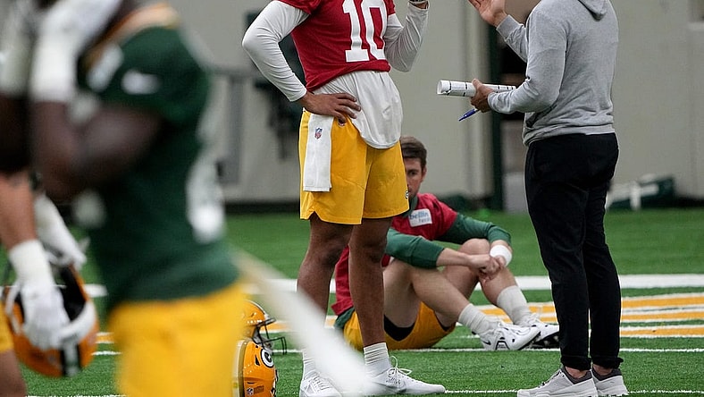 Green Bay Packers head coach Matt LaFleur talks with quarterback Jordan Love (10) during organized team activities Tuesday, May 23, 2023 in Green Bay, Wis.