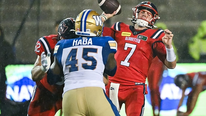 Jul 1, 2023; Montreal, Quebec, CAN; Montreal Alouettes quarterback Cody Fajardo (7) passes the ball against the Winnipeg Blue Bombers during the third quarter at Percival Molson Memorial Stadium. Mandatory Credit: David Kirouac-USA TODAY Sports