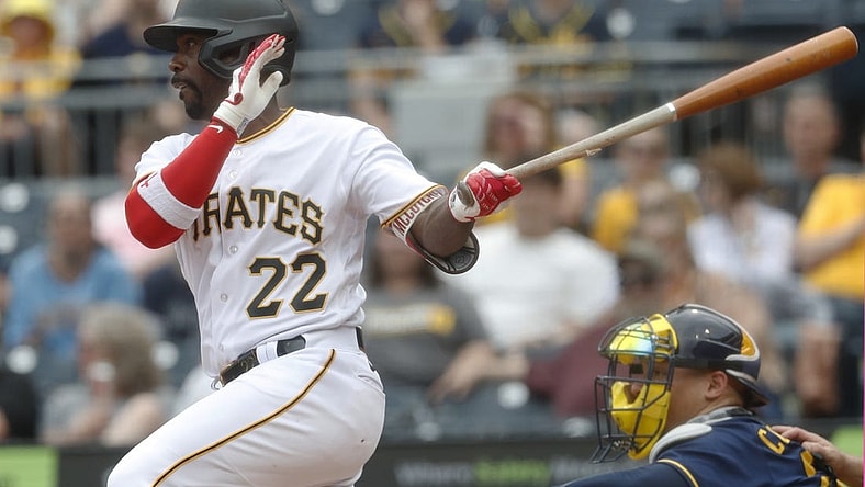 Jul 2, 2023; Pittsburgh, Pennsylvania, USA;  Pittsburgh Pirates designated hitter Andrew McCutchen (22) at bat against the Milwaukee Brewers during the eighth inning at PNC Park. The Brewers won 6-3. Mandatory Credit: Charles LeClaire-USA TODAY Sports