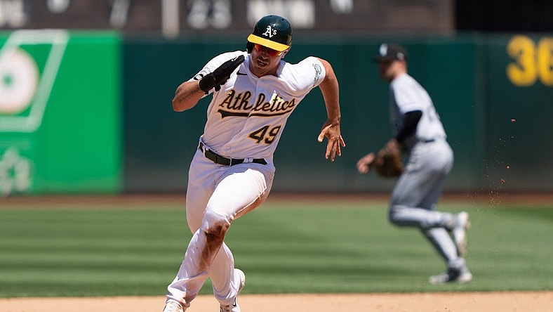 Jul 2, 2023; Oakland, California, USA;  Oakland Athletics first baseman Ryan Noda (49) runs during the fifth inning against the Chicago White Sox at Oakland-Alameda County Coliseum. Mandatory Credit: Stan Szeto-USA TODAY Sports