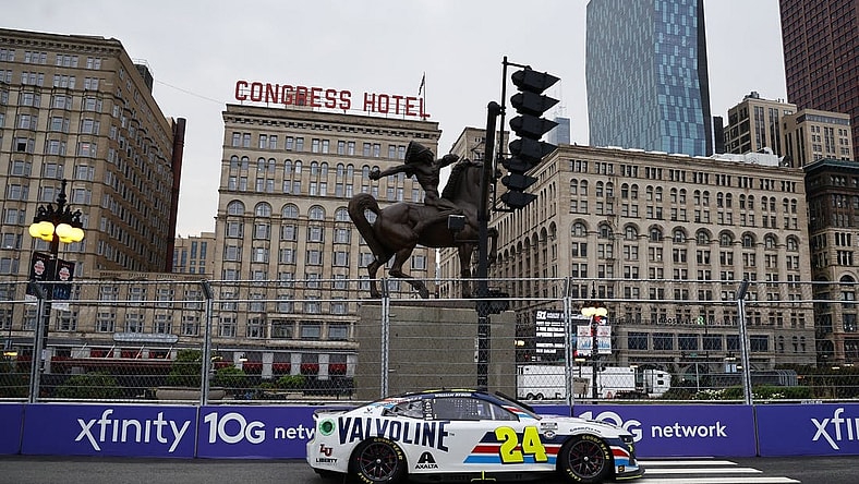 Jul 2, 2023; Chicago, Illinois, USA; NASCAR Cup Series driver William Byron (24) races along Grant Park during the Grant Park 220 of the Chicago Street Race at Chicago Street Race. Mandatory Credit: Mike Dinovo-USA TODAY Sports