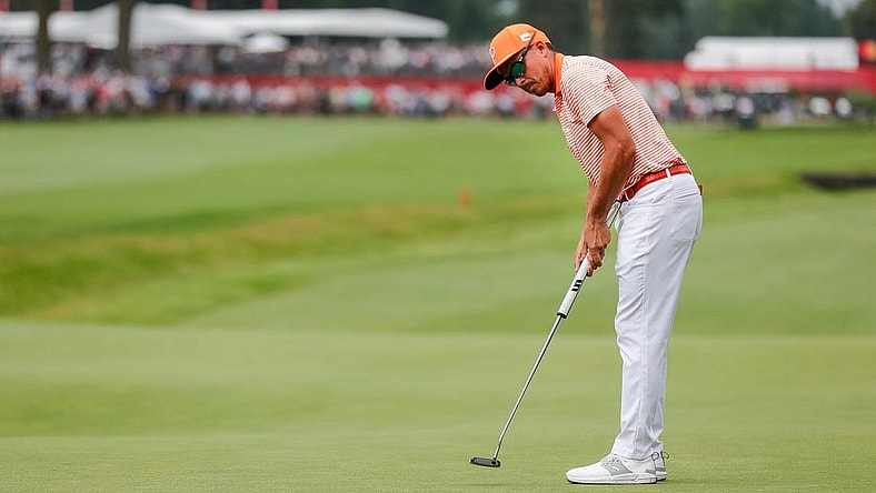 Rickie Fowler putts a birdie on the 18th hole at the first playoff round during the fourth round of Rocket Mortgage Classic at Detroit Golf Club in Detroit on Sunday, July 2, 2023.