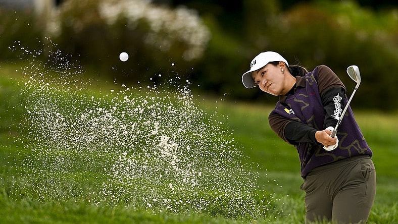 Jul 6, 2023; Pebble Beach, California, USA; Annie Park hits out of the bunker on the 14th hole during the first round of the U.S. Women's Open golf tournament at Pebble Beach Golf Links. Mandatory Credit: Kelvin Kuo-USA TODAY Sports