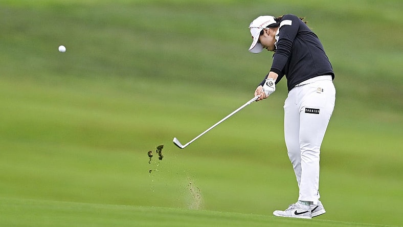 Jul 6, 2023; Pebble Beach, California, USA; Xiyu Janet Lin hits an approach shot on the 13th hole during the first round of the U.S. Women's Open golf tournament at Pebble Beach Golf Links. Mandatory Credit: Kelvin Kuo-USA TODAY Sports