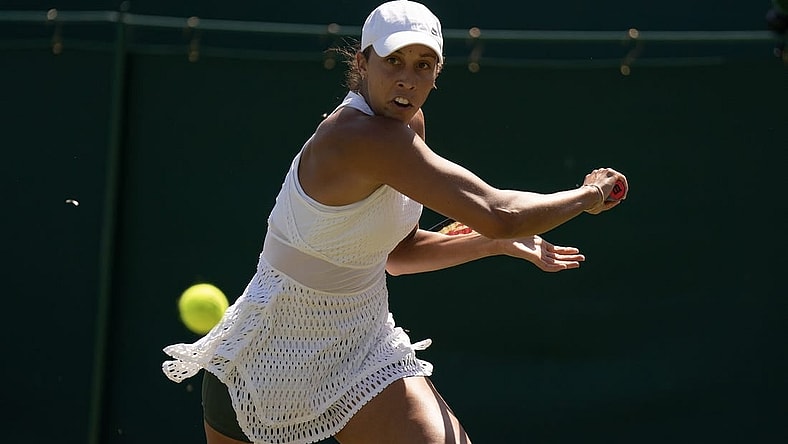 Jul 7, 2023; London, United Kingdom; Madison Keys (USA) returns a shot during her match against Viktorija Golubic (SUI) on day five at the All England Lawn Tennis and Croquet Club.  Mandatory Credit: Susan Mullane-USA TODAY Sports
