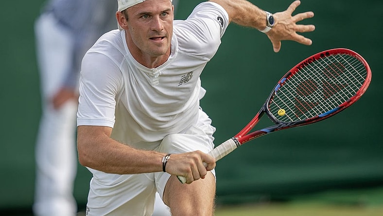 Jul 8, 2023; London, United Kingdom; Tommy Paul (USA) runs for the ball during his match against Jiri Lehecka (CZE) on day six at the All England Lawn Tennis and Croquet Club.  Mandatory Credit: Susan Mullane-USA TODAY Sports