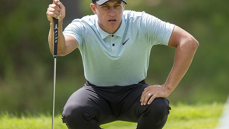 Jul 8, 2023; Silvis, Illinois, USA; Cameron Champ lines up a putt on the 9th hole during the third round of the John Deere Classic golf tournament. Mandatory Credit: Marc Lebryk-USA TODAY Sports