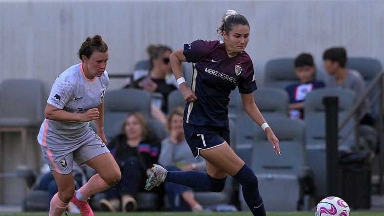 Jul 9, 2023; Los Angeles, California, USA; North Carolina Courage defender Malia Berkely (7) handles the ball against Angel City FC during the first half at BMO Stadium. Mandatory Credit: Jayne Kamin-Oncea-USA TODAY Sports
