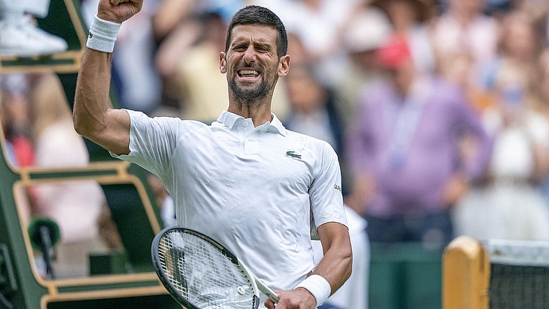 Jul 11, 2023; London, United Kingdom; Novak Djokovic (SRB) celebrates winning his match against Andrey Rublev on day nine at the All England Lawn Tennis and Croquet Club.  Mandatory Credit: Susan Mullane-USA TODAY Sports