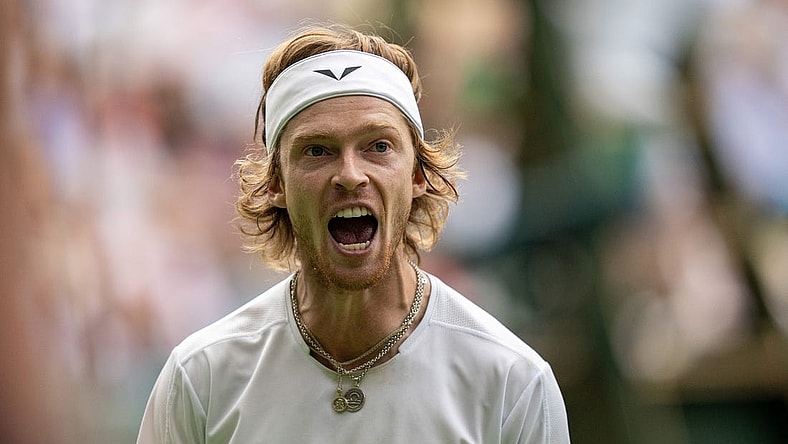 Jul 11, 2023; London, United Kingdom; Andrey Rublev reacts to a point during his match against Novak Djokovic (SRB) on day nine at the All England Lawn Tennis and Croquet Club. Mandatory Credit: Susan Mullane-USA TODAY Sports