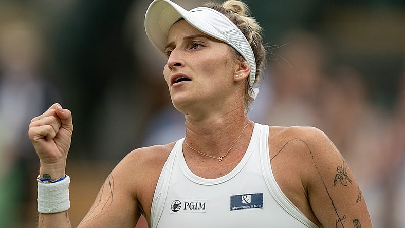 Jul 11, 2023; London, United Kingdom; Marketa Vondrousova (CZE) reacts to a point during her match against Jessica Pegula (USA) on day nine of Wimbledon at the All England Lawn Tennis and Croquet Club.  Mandatory Credit: Susan Mullane-USA TODAY Sports