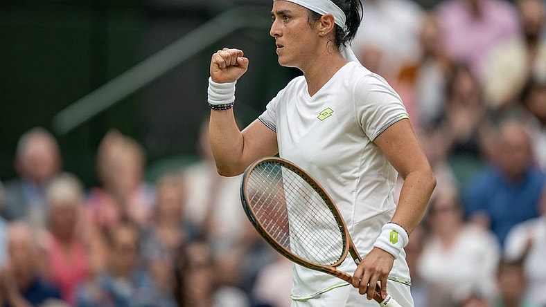 Jul 13, 2023; London, United Kingdom; Ons Jabeur (TUN) reacts to a point during her match against Aryna Sabalenka on day 11 at the All England Lawn Tennis and Croquet Club.  Mandatory Credit: Susan Mullane-USA TODAY Sports