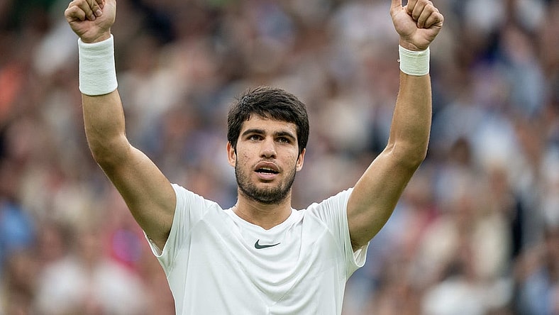Jul 14, 2023; London, United Kingdom; Carlos Alcaraz (ESP) celebrates winning his match against Daniil Medvedev on day 12 at the All England Lawn Tennis and Croquet Club.  Mandatory Credit: Susan Mullane-USA TODAY Sports