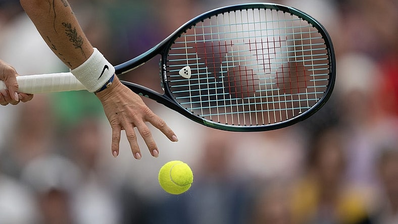 Jul 15, 2023; London, United Kingdom; Marketa Vondrousova (CZE) bounces the ball prior to serving during the women   s final against Ons Jabeur (TUN) on day 13 at the All England Lawn Tennis and Croquet Club. Mandatory Credit: Susan Mullane-USA TODAY Sports
