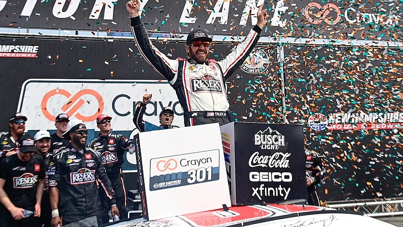 Jul 17, 2023; Loudon, New Hampshire, USA; NASCAR Cup Series driver Martin Truex Jr. (19) celebrates winning the Crayon 301 at New Hampshire Motor Speedway. Mandatory Credit: Eric Canha-USA TODAY Sports