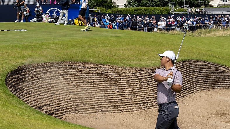 July 19, 2023; Hoylake, ENGLAND, GBR; Tom Kim hits out of the bunker on the 17th hole during a practice round of The Open Championship golf tournament at Royal Liverpool. Mandatory Credit: Kyle Terada-USA TODAY Sports