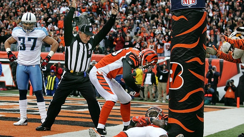 Tennessee Titans safety Calvin Lowry (37) watches as Cincinnati Bengals wide receiver Chad Johnson (85) and teammate Chris Henry (15) celebrate a touchdown in the fourth quarter during their game at Paul Brown Stadium.
November 25, 2007 (photo GEORGE WALKER IV / THE TENNESSEAN)