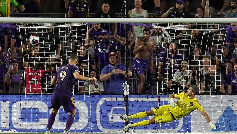 Jul 21, 2023; Orlando, FL, USA; Orlando City forward Ercan Kara (9) scores a goal during the penalty kick shoot out after the game against Houston Dynamo at Exploria Stadium. Mandatory Credit: Cory Knowlton-USA TODAY Sports