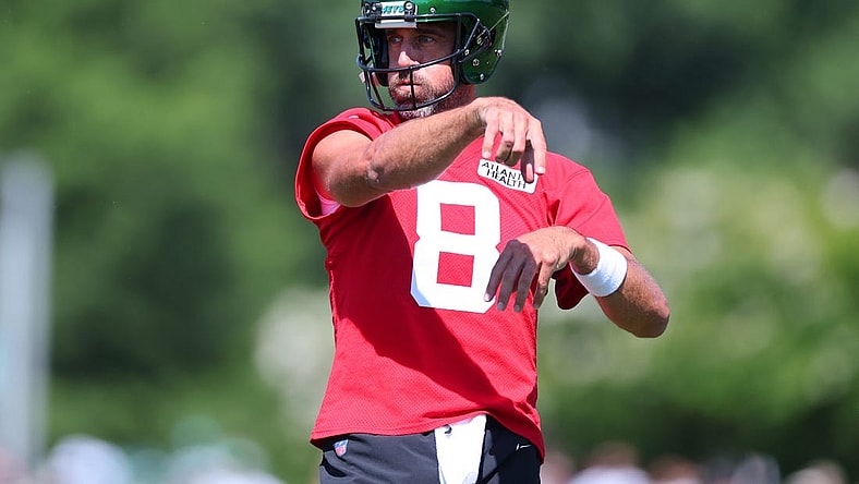 Jul 22, 2023; Florham Park, NJ, USA; New York Jets quarterback Aaron Rodgers (8) participates in drills during the New York Jets Training Camp at Atlantic Health Jets Training Center. Mandatory Credit: Vincent Carchietta-USA TODAY Sports