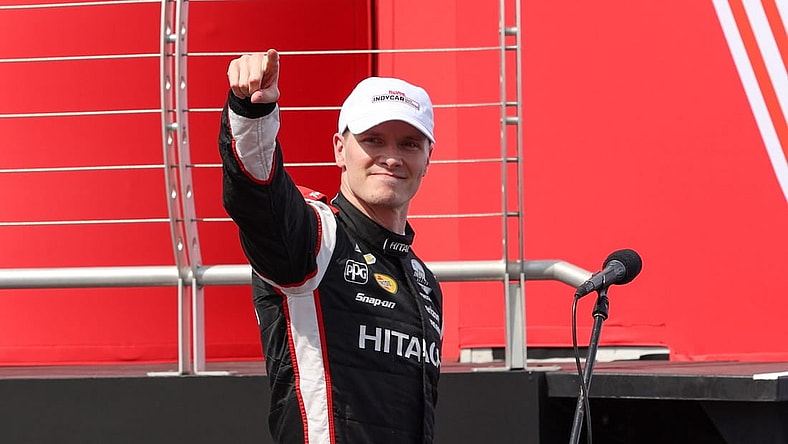 Jul 22, 2023; Newton, Iowa, USA; Team Penske driver Josef Newgarden of the United States celebrates winning the Hy-Vee Homefront 250 at the Iowa Speedway. Mandatory Credit: Reese Strickland-USA TODAY Sports