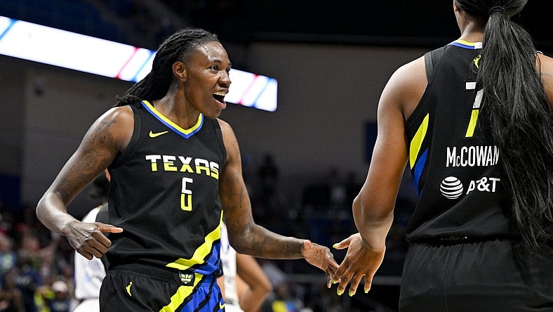 Jul 22, 2023; Arlington, Texas, USA; g6 and center Teaira McCowan (7) celebrate during the second half against the Los Angeles Sparks at College Park Center. Mandatory Credit: Jerome Miron-USA TODAY Sports