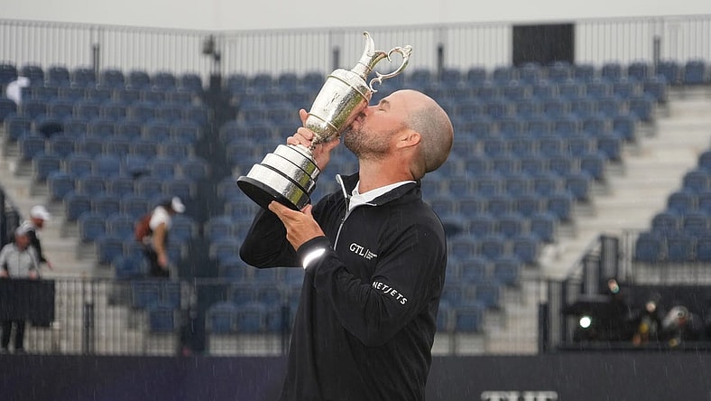 Jul 23, 2023; Hoylake, England, GBR; Brian Harman kisses the Claret Jug after winning The Open Championship golf tournament. Mandatory Credit: Kyle Terada-USA TODAY Sports