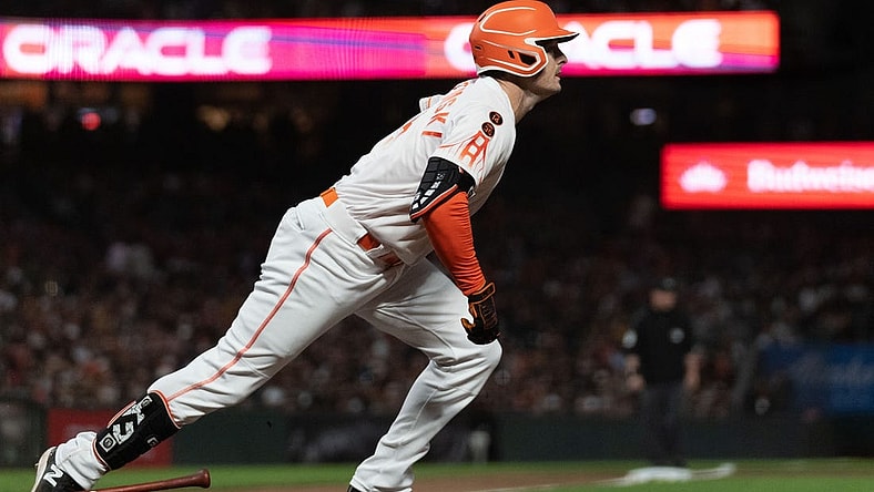 Jul 25, 2023; San Francisco, California, USA;  San Francisco Giants center fielder Mike Yastrzemski (5) runs to first base during the eighth inning against the Oakland Athletics at Oracle Park. Mandatory Credit: Stan Szeto-USA TODAY Sports