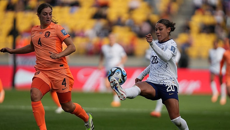 Jul 27, 2023; Wellington, NZL; United States forward Trinity Rodman (20) kicks the ball past Netherlands defender Aniek Nouwen (4) during the second half in a group stage match for the 2023 FIFA Women's World Cup at Wellington Regional Stadium. Mandatory Credit: Jenna Watson-USA TODAY Sports