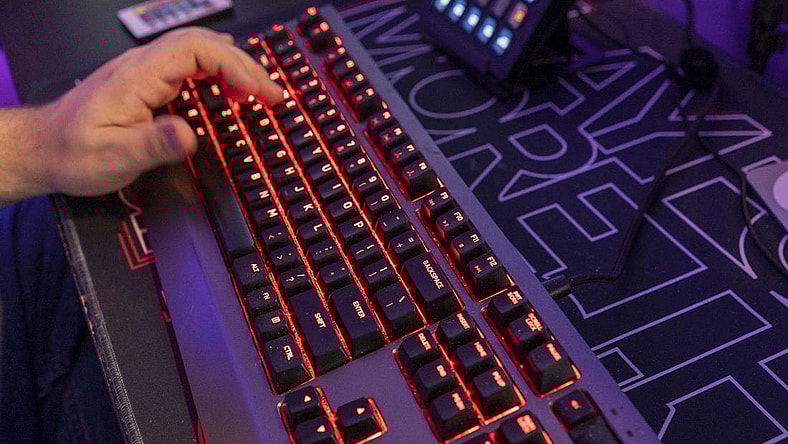 A backlit keyboard is part of the gear online video game streamer Jordan Woodruff uses in his Gilbert home.

Jordan Woodruff