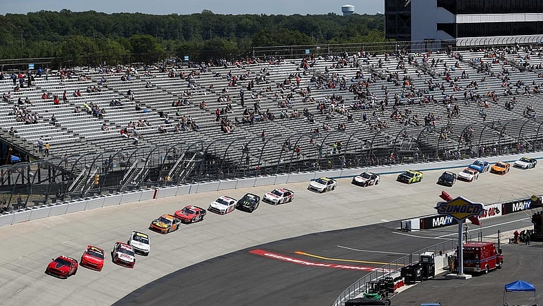 May 15, 2021; Dover, DE, USA; NASCAR XFINITY Series cars sit on the racetrack under a red flag during the Drydene 200 at Dover International Speedway. Mandatory Credit: Matthew OHaren-USA TODAY Sports