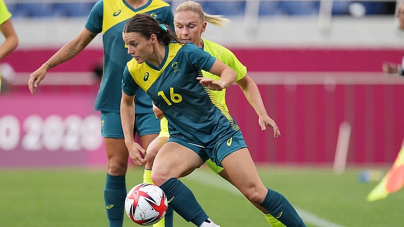 Jul 24, 2021; Saitama, Japan; Australia player Hayley Raso (16) moves the ball agains Sweden player Jonna Andersson (2) during the Tokyo 2020 Olympic Summer Games at Saitama Stadium. Mandatory Credit: Jack Gruber-USA TODAY Network