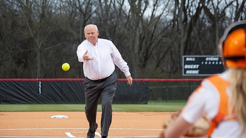 University of Tennessee Athletic Director Phillip Fulmer throws the opening pitch of the of the Misstate Classic doubleheader at the Ridley Park Sports Complex in Columbia on Tuesday, March 12, 2019.